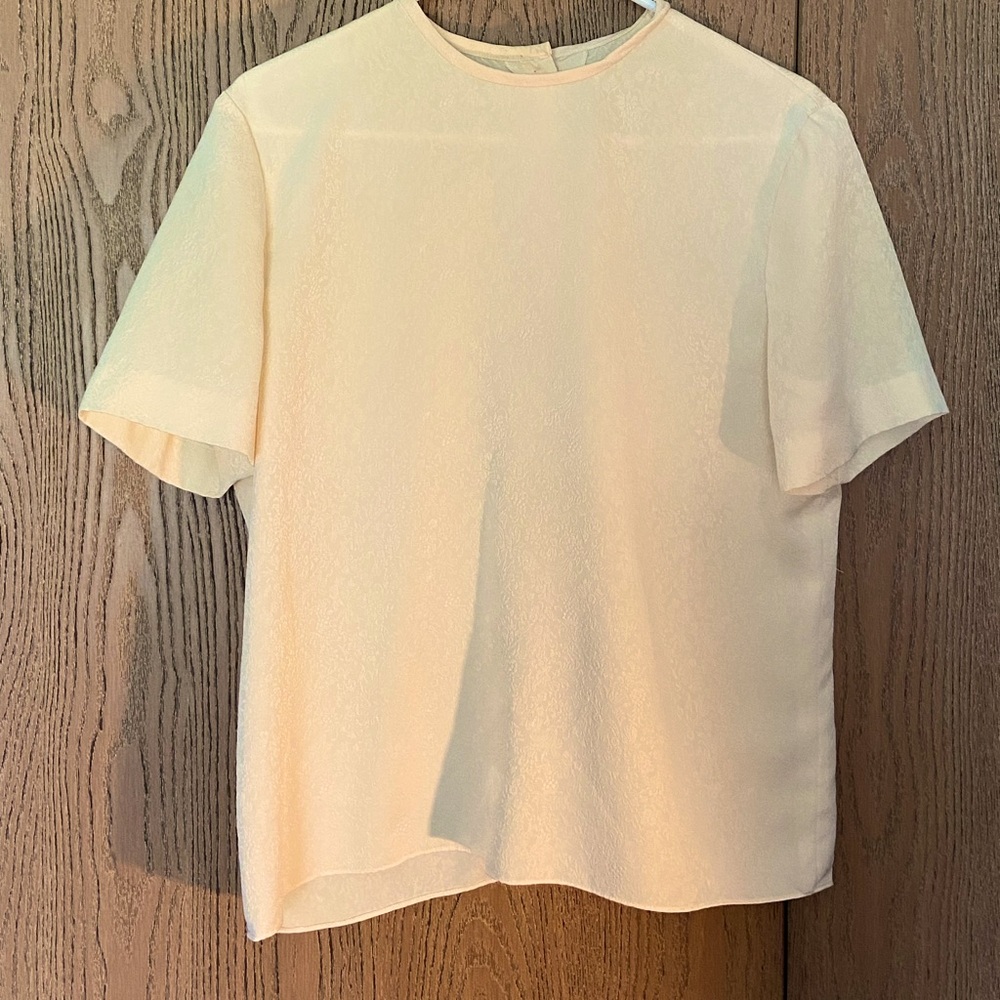 Pale yellow, floral patterned short sleeve shirt
